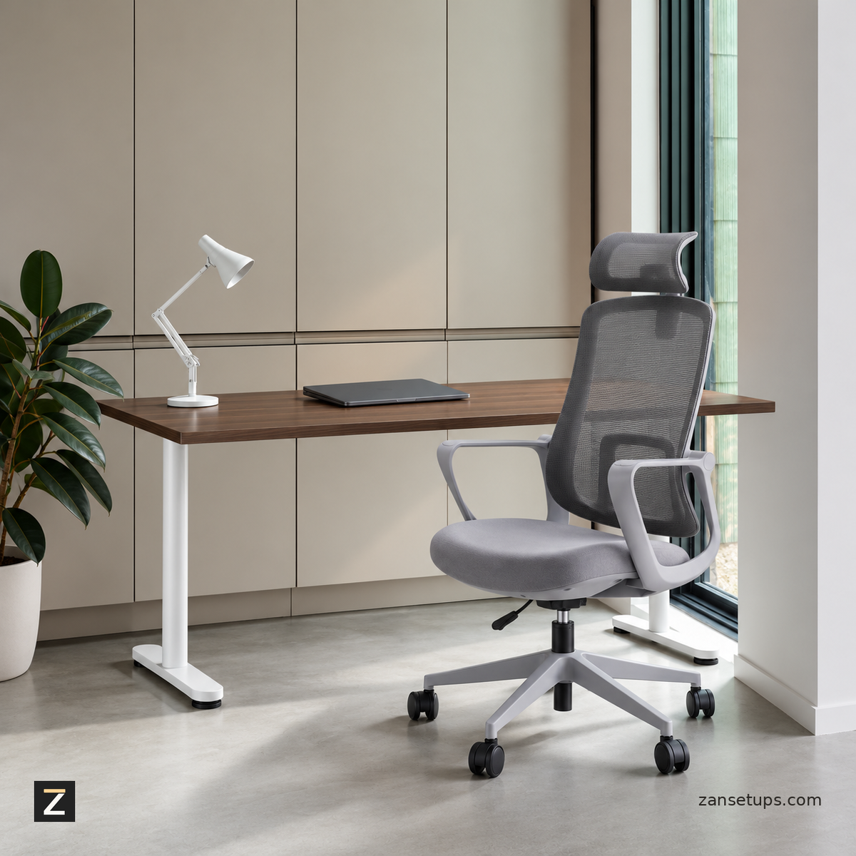 A desk, an ergonomic chair, a monitor arm and a headphone stand arranged in a bright room